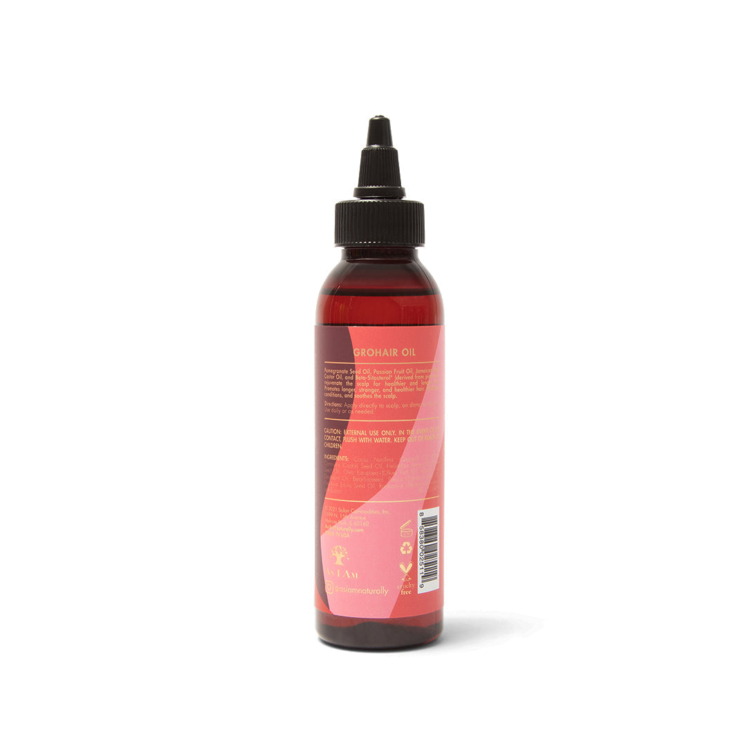 Nærbillede af etiketten på bagsiden af As I Am Long & Luxe GroHair Oil, der fremhæver ingredienser, brugsanvisning og advarsler.