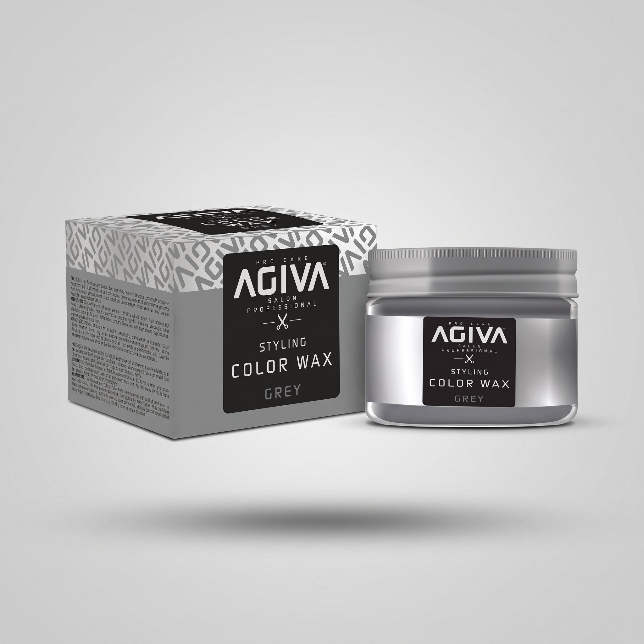 Agiva Color Wax Grey styling-hårvoks i sølvfarvet krukke ved siden af emballage med grå mønstret æske.